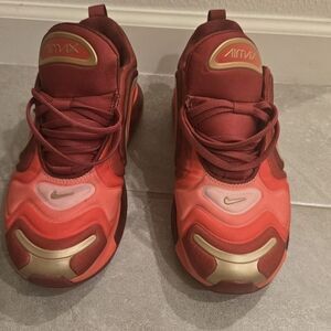 Nike Red and Gold Athletic Sneakers with Modern Design